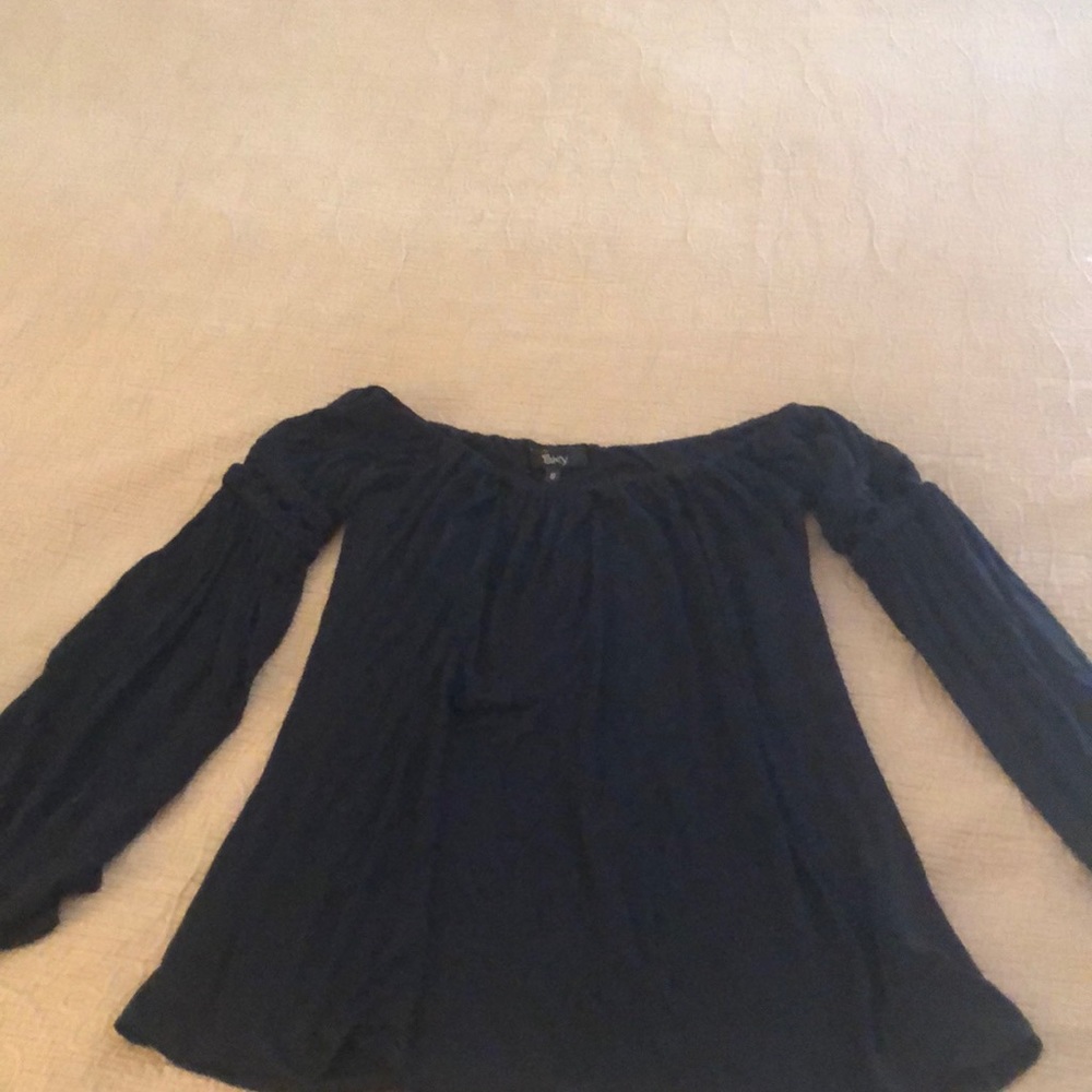 Black long sleeved cotton top off shoulder.